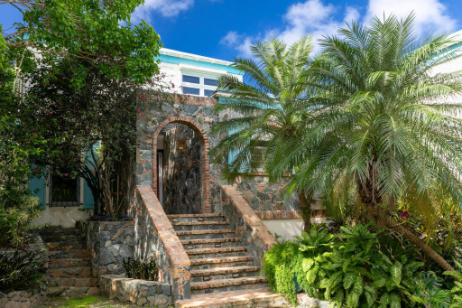 Villa entry with traditional Caribbean stonework