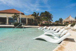 Relax and enjoy the Caribbean sun by one of the three communal pools at Gold Coast