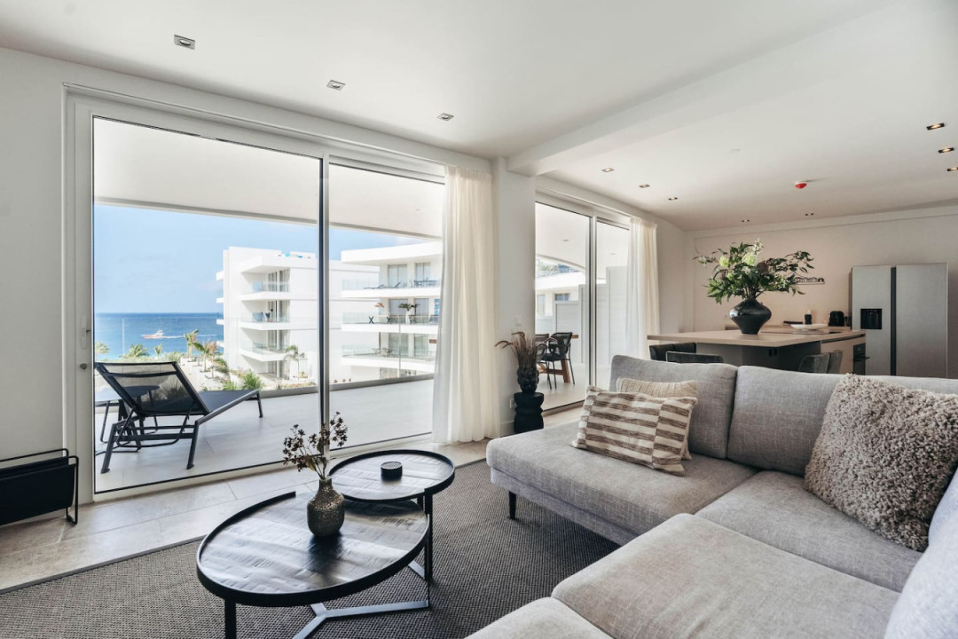 Imagine enjoying your morning coffee with this view. Our living room offers the perfect blend of comfort and breathtaking scenery.`