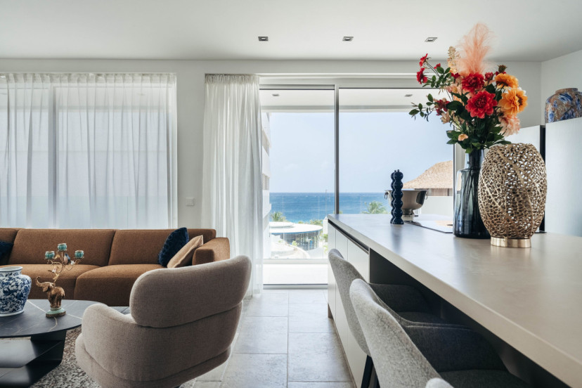 Cozy vibes and ocean views—this space is all about relaxation!