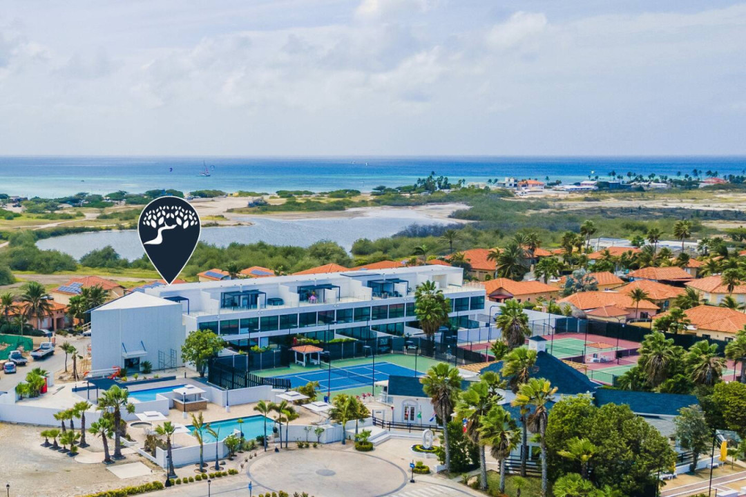 Welcome to The Opal 236, Unit 2 - a stunning 3-story townhouse in a modern gated community within Aruba’s prestigious Aruba Racquet Club. Ideally located near the world-famous beaches and high-rise hotels, perfect for your Aruba getaway