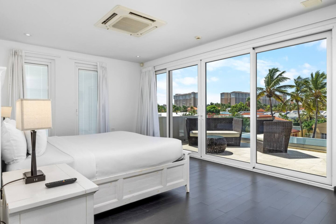 You'll feel pampered like royalty on the comfortable king-size bed in the master bedroom with a large balcony