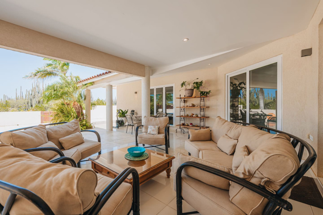 Relax on our spacious patio, perfectly situated by the pool. Enjoy leisurely afternoons and vibrant evenings in this inviting outdoor space designed for comfort and style.
