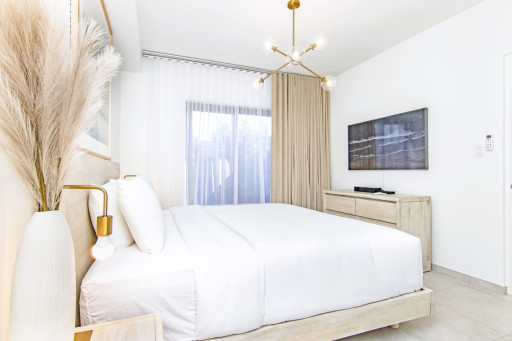 Master Bedroom | Wake up every morning with the sunny blue sky of Aruba right outside your window