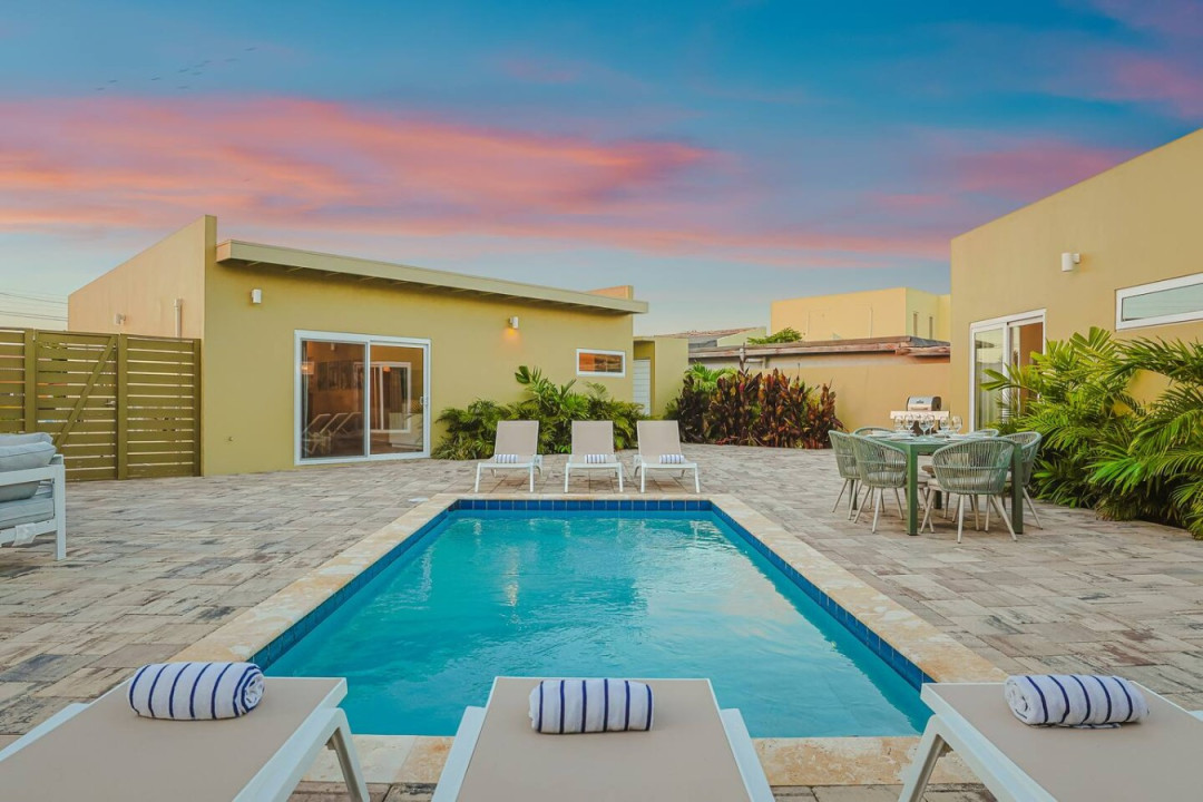 Take a refreshing dip in the pool, lounge in the sun, or gather around the outdoor dining table for unforgettable meals and memories.