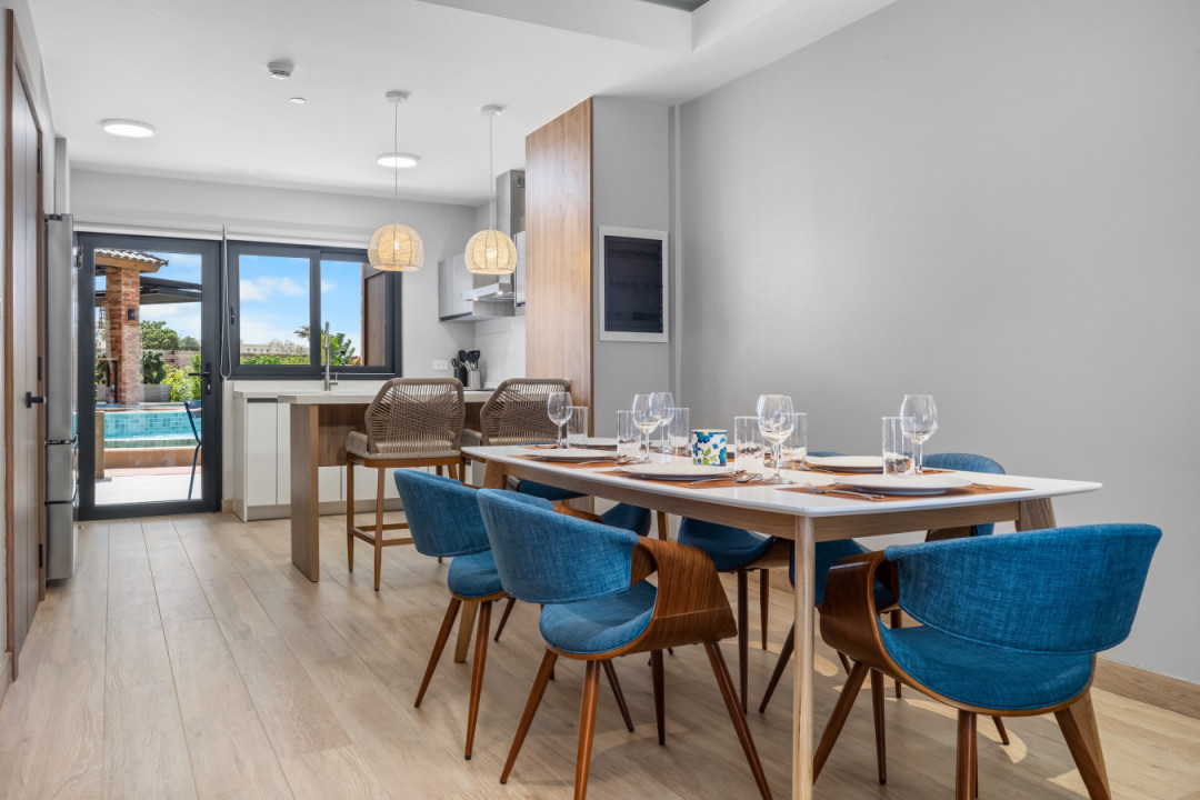 This dining area is ready for a good time! It’s the perfect spot for sharing meals and making memories with friends.