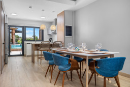 This dining area is ready for a good time! It’s the perfect spot for sharing meals and making memories with friends.
