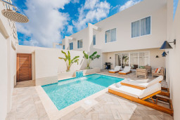 Step into your own private oasis — a modern villa with a sparkling pool, outdoor lounge, and serene tropical touches. Perfect for sunbathing, relaxing, and creating unforgettable vacation moments.