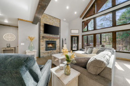 The flat-screen Smart TV and cozy fireplace in the living area make it the perfect spot to gather and unwind.