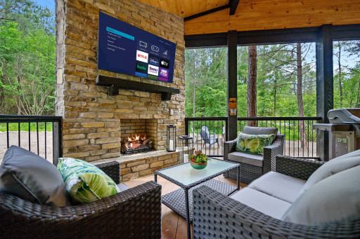 Our spacious back deck has a sitting lounge complete with a fireplace and a Smart TV.