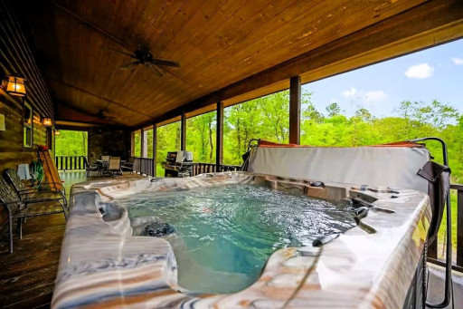 Unwind in the relaxing hot tub on the upper deck.