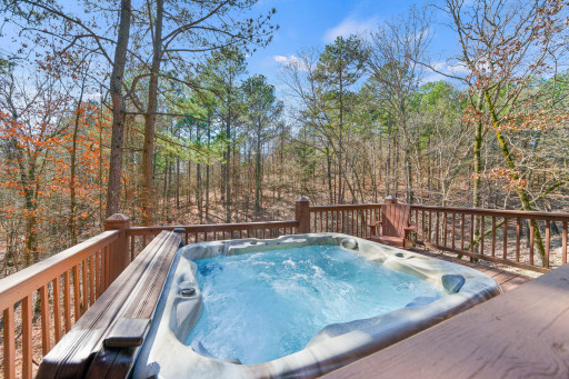 Take in the forest views and unwind in the private outdoor hot tub.